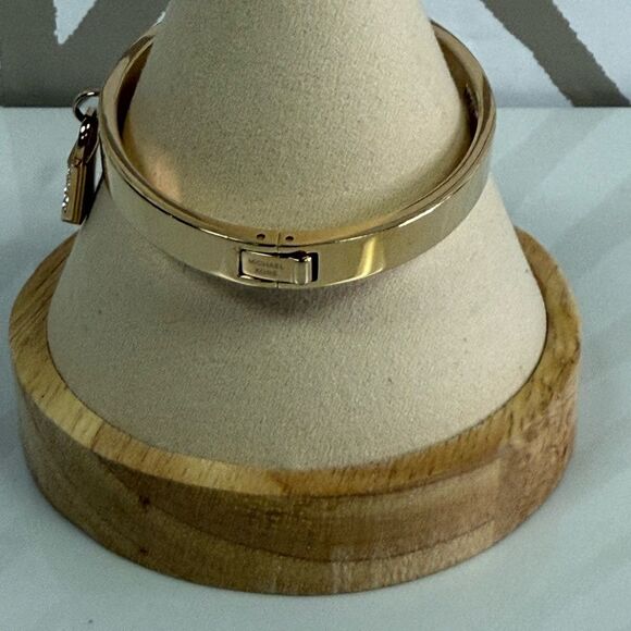 Michael Kors Goldtone Iconic Pace Lock Hinged Bracelet - Picture 4 of 7